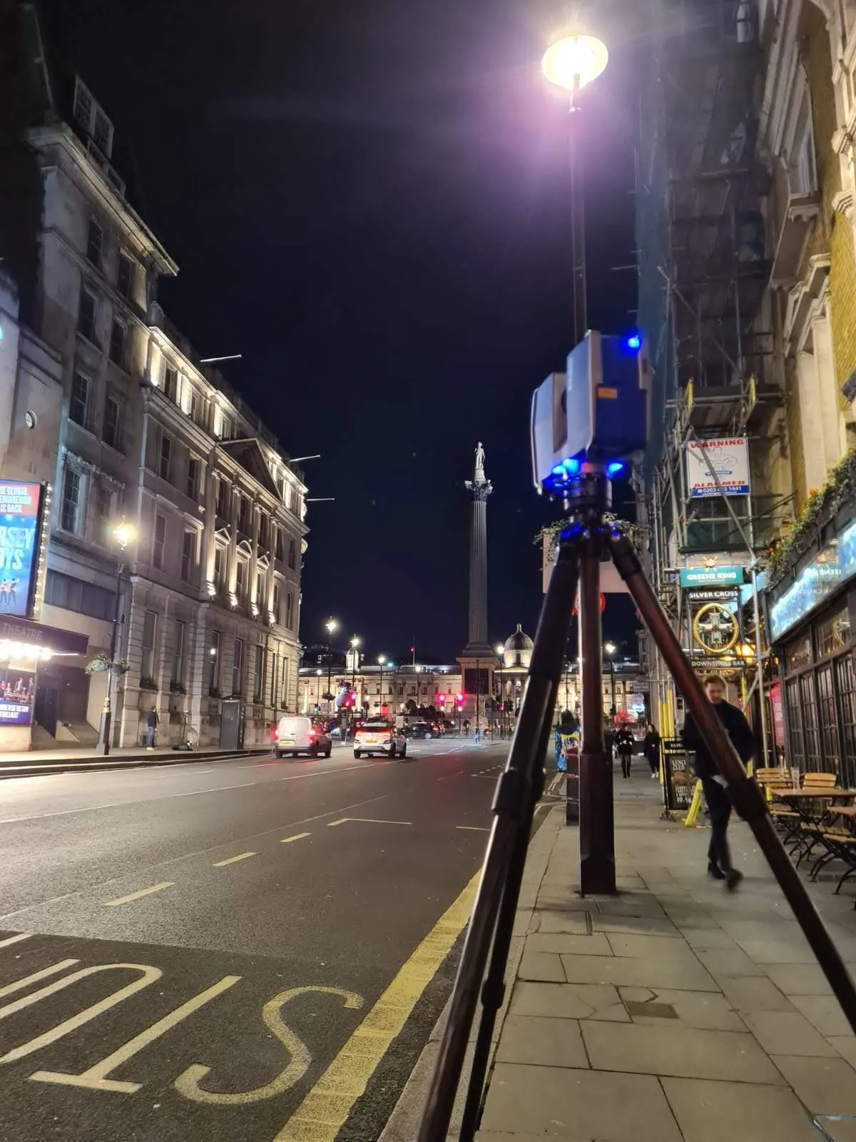 FARO laser scanner on a tripod scanning Whitehall at night