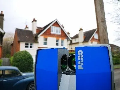 3D laser scanning outside of a house in London.