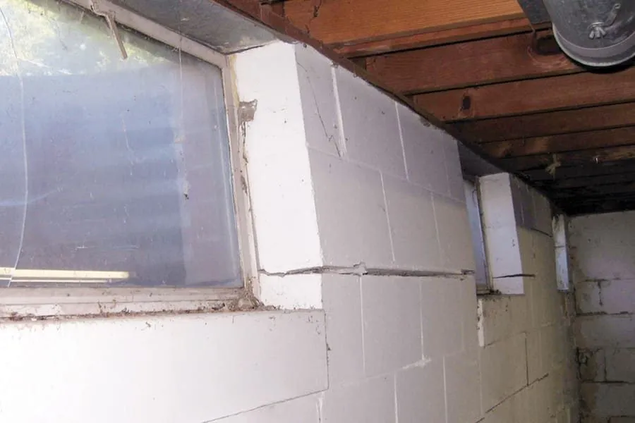 A bulge in a block wall.