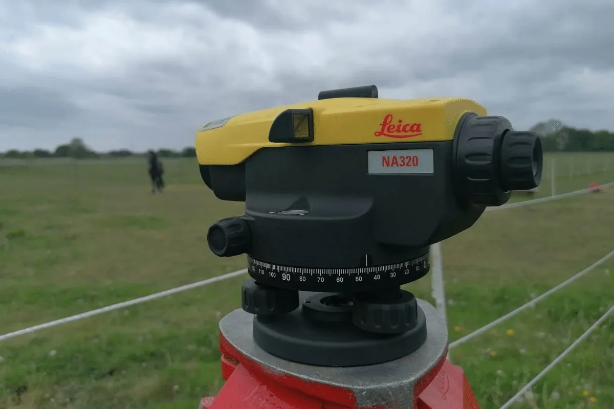 Dumpy level in a field