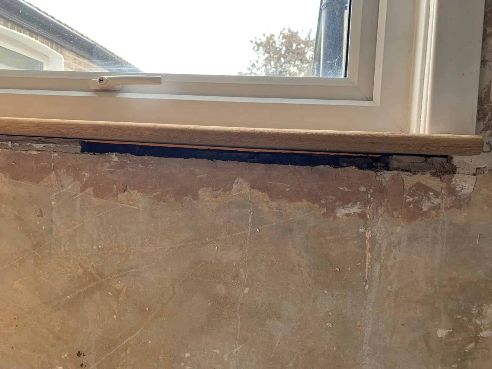 Gaps around a damaged window
