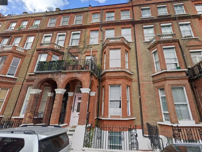 Victorian red-brick terrace of flats, an example of a larger measured survey