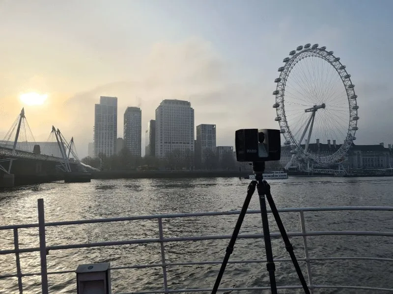 A measured survey being undertaken with a 3D laser scanner near the River Thames in London.