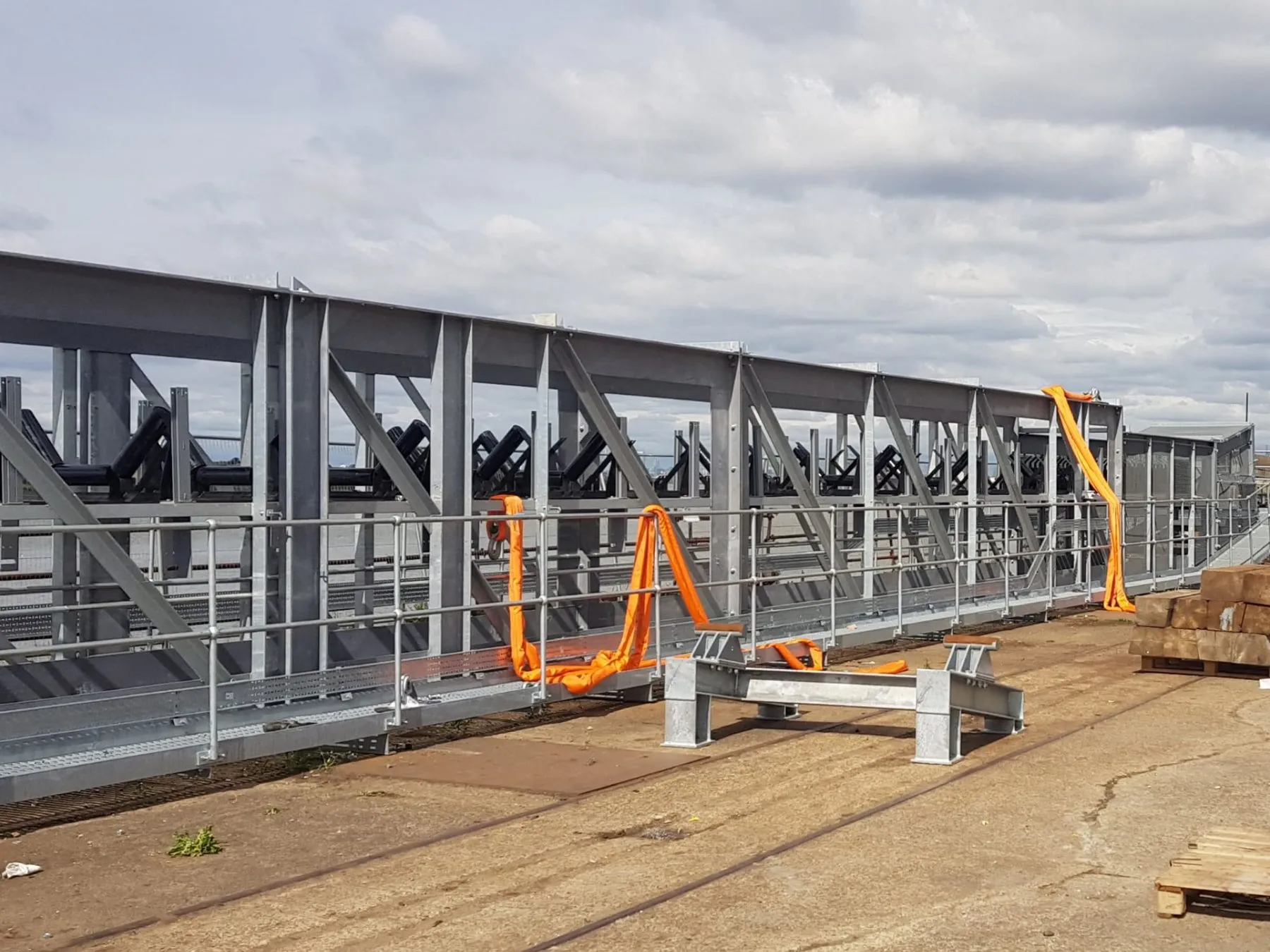 A new conveyor section assembled on the quayside before lifting