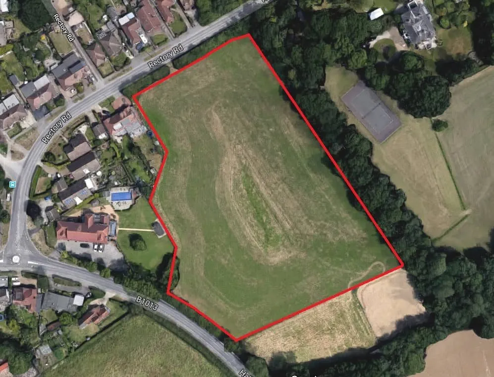 Aerial photo of a whole field outlined in red as the survey area