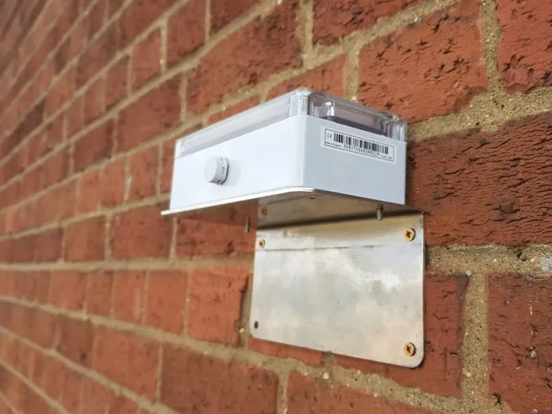 Wireless tilt sensor fixed to a brick wall