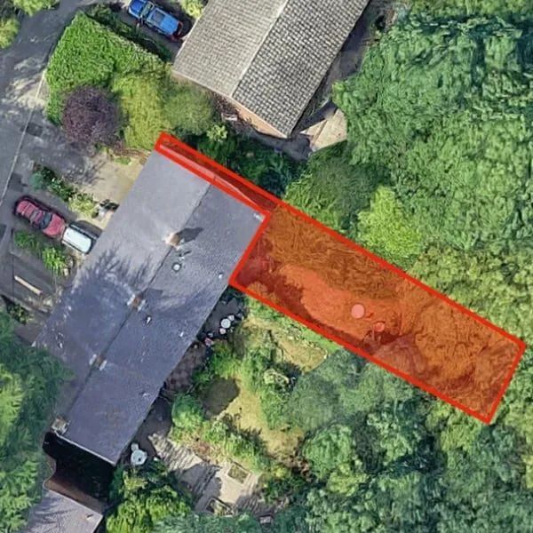 Aerial photo of a small residential garden plot outlined in red