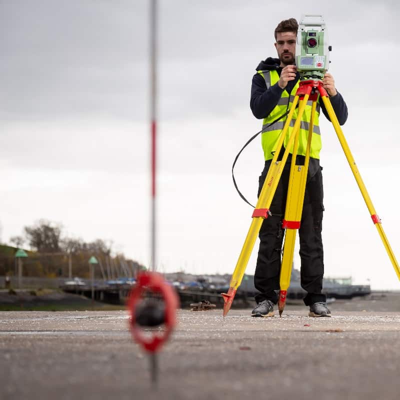 topographical land surveyor with prism and total station