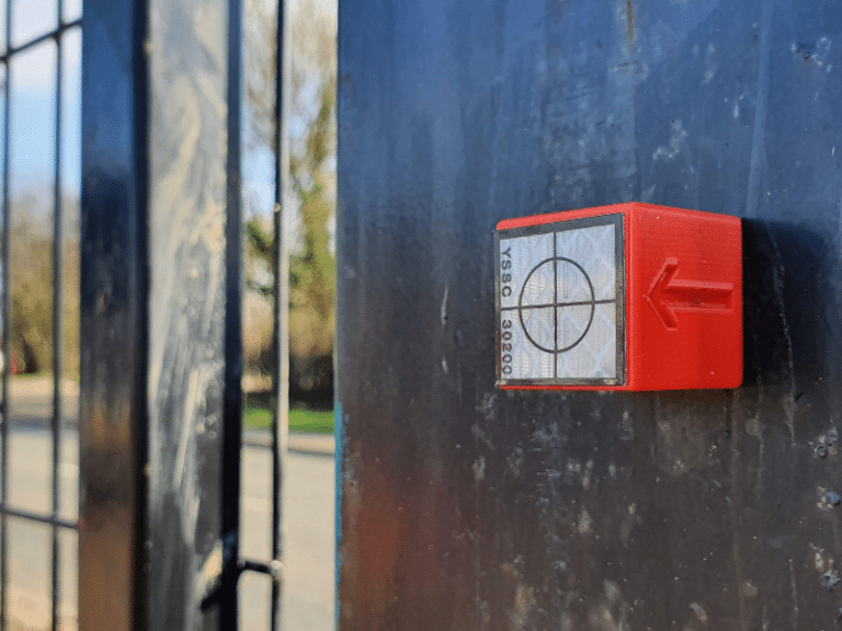 THSM20 survey target mounted on a gate
